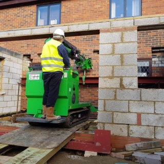 The Hooka maneuvering 450kg I-beam up ramp preparing for lift - Image 2